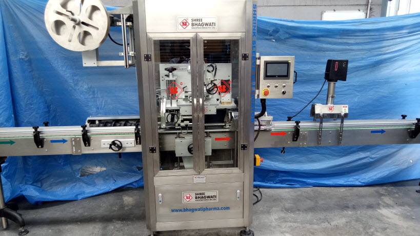 Shrink Label Inserting Machine and Sleeve Labeller