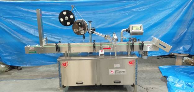 Top Labeling with auto Stackker Feeder