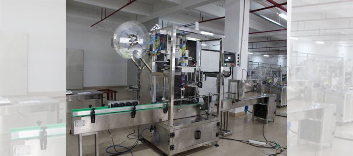 Automatic Shrink Sleeve Label Inserter Machine: Shrink Label Inserting Machine